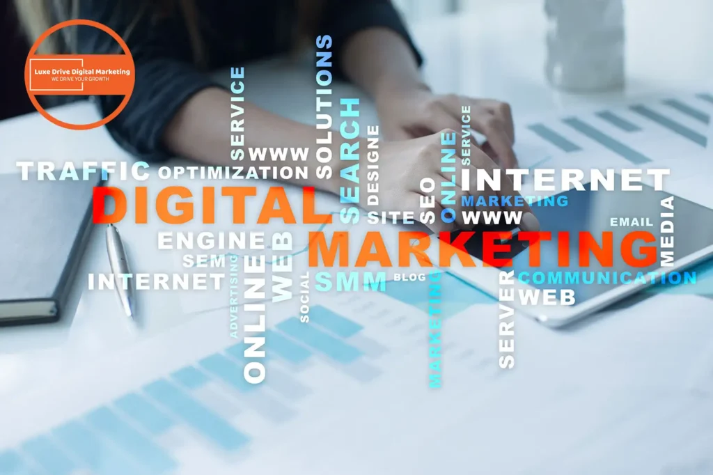 Luxe Drive Digital Marketing America's Top Marketing Agency A person using a tablet at a desk with digital marketing-related words like "SEO," "traffic optimization," and "social media" overlaying the image. A circular logo reads "Luxe Drive Digital Marketing. Luxe Drive Digital Marketing We Drive Your Growth