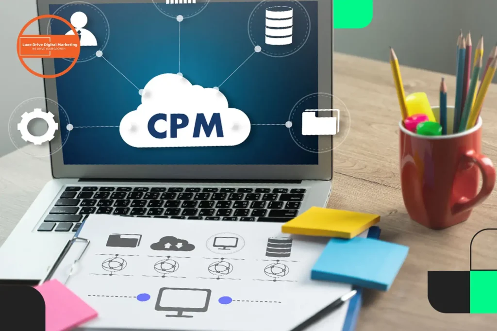 Luxe Drive Digital Marketing America's Top Marketing Agency Laptop displaying CPM with cloud icon on screen, surrounded by digital marketing icons. Nearby are design sketches, sticky notes, and a mug holding colorful pencils. Luxe Drive Digital Marketing We Drive Your Growth