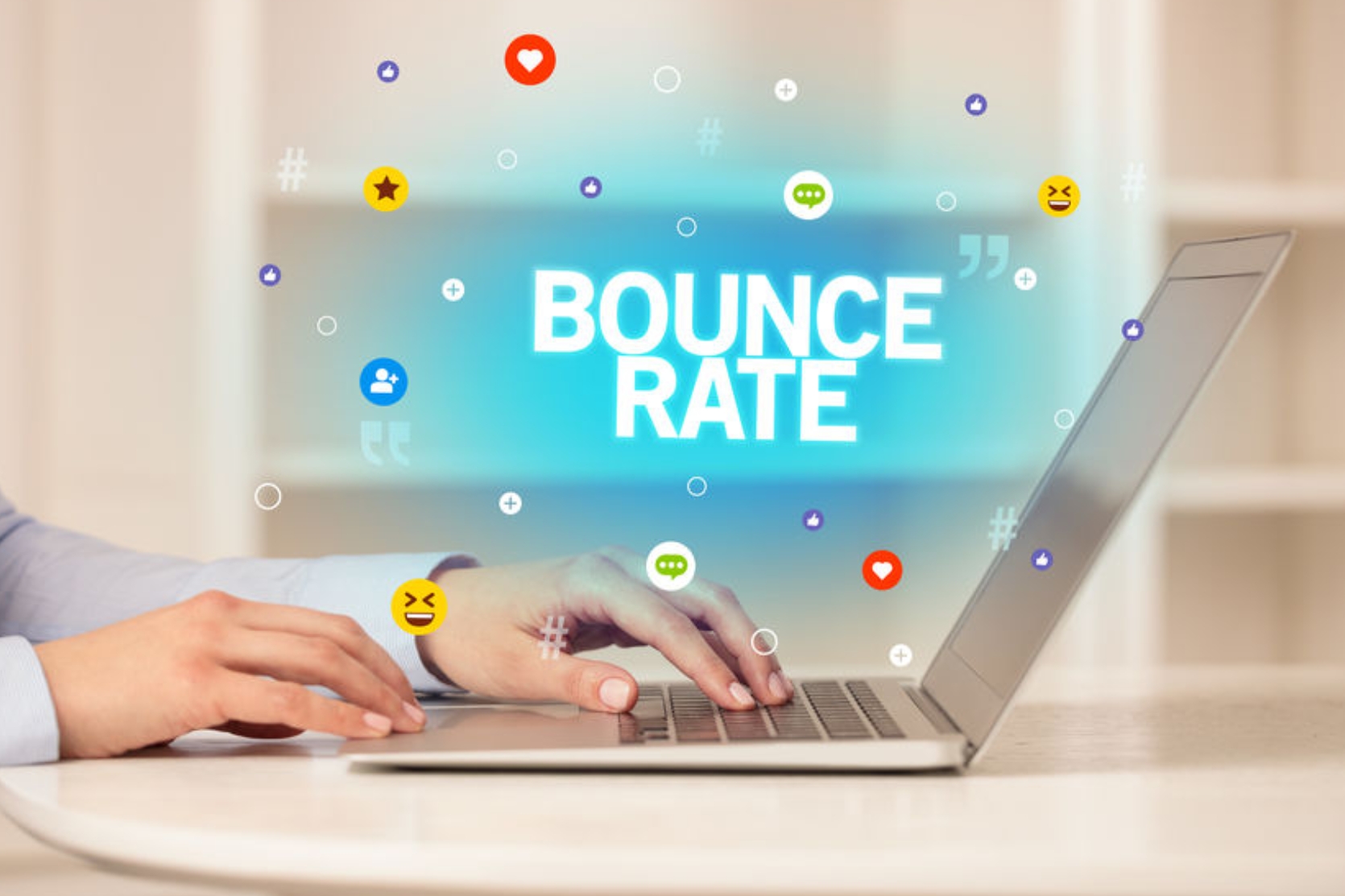 Luxe Drive Digital Marketing America&#039;s Top Marketing Agency Person typing on a laptop with the words &quot;BOUNCE RATE&quot; and various digital icons floating above the keyboard. Luxe Drive Digital Marketing We Drive Your Growth